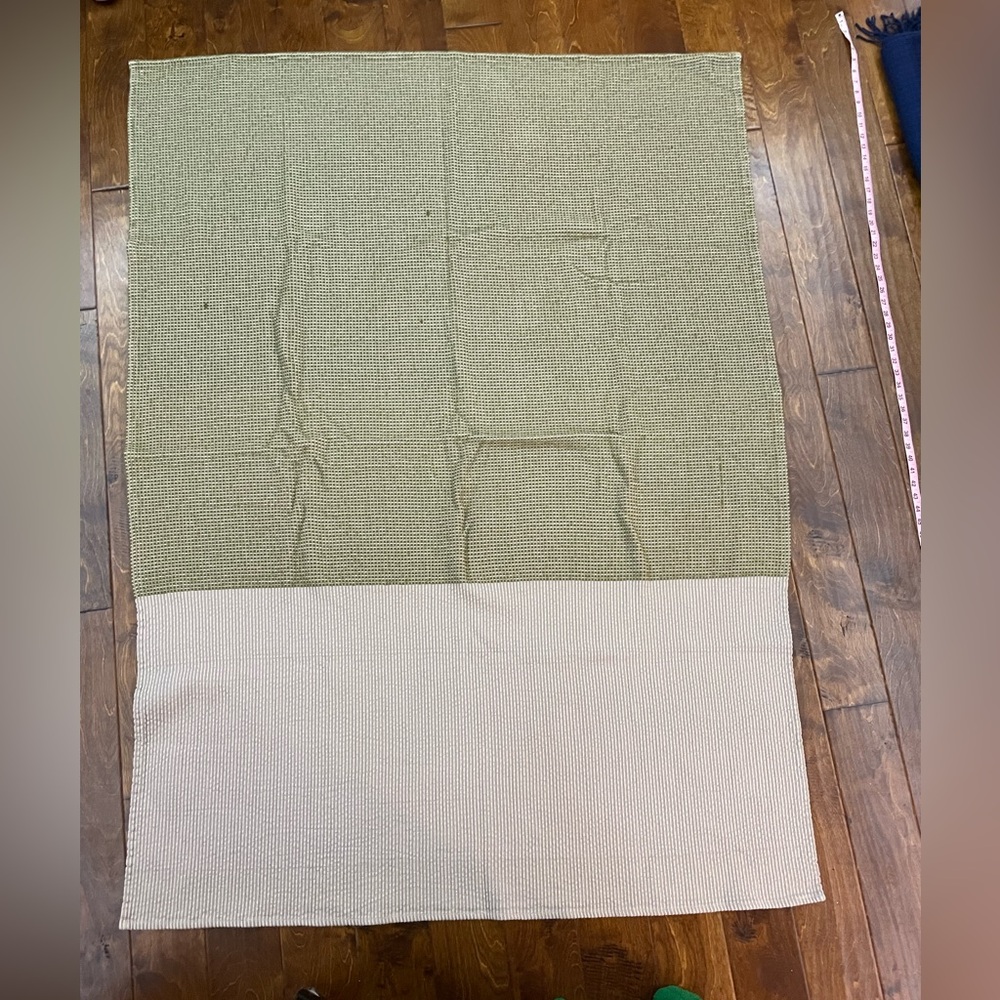 Green cotton blanket from Casper